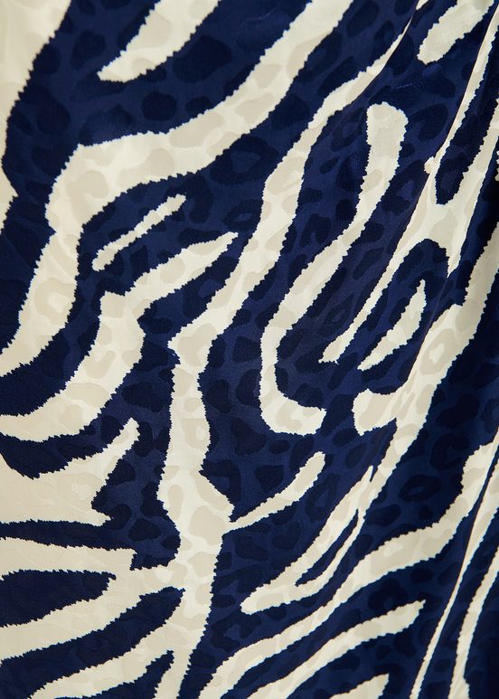 Navy blue and off-white zebra-print top