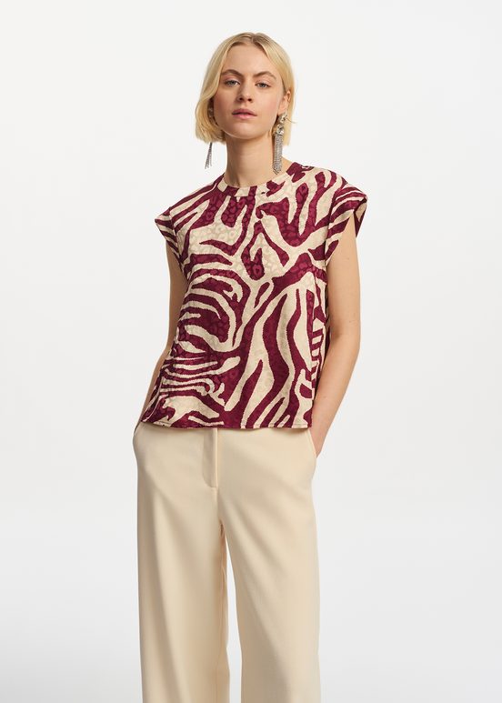 Burgundy and ecru zebra-print top