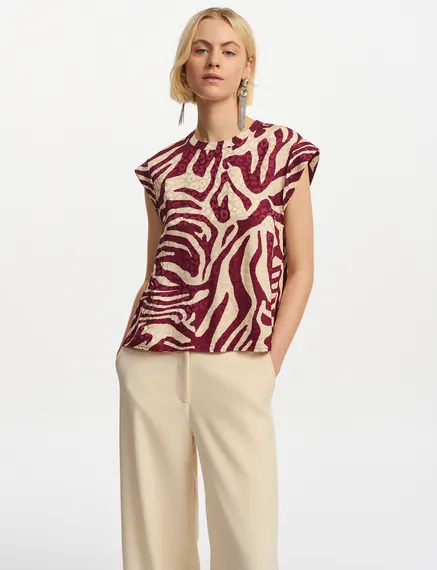 Burgundy and ecru zebra-print top