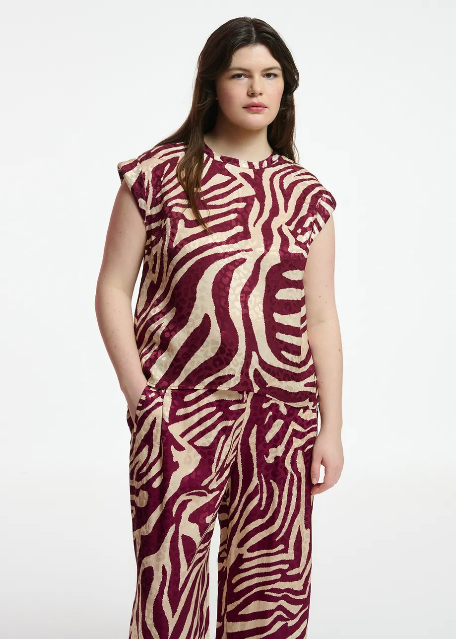 Burgundy and ecru zebra-print top