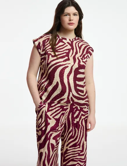 Burgundy and ecru zebra-print top