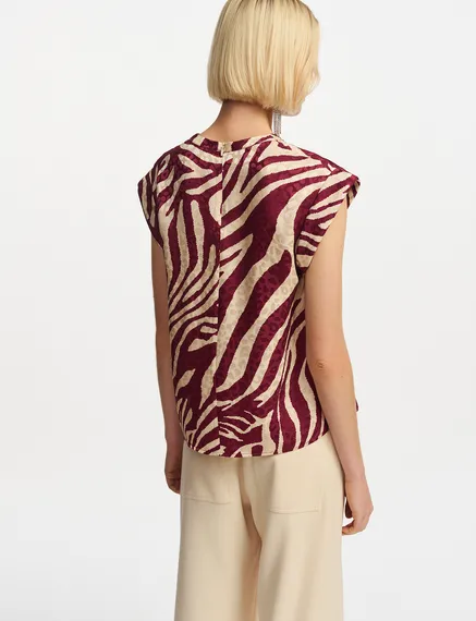 Burgundy and ecru zebra-print top