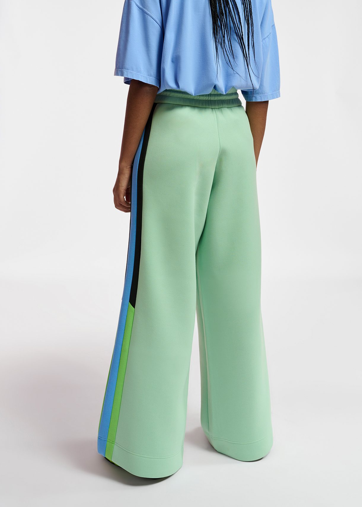 Blue pants clearance with green stripes