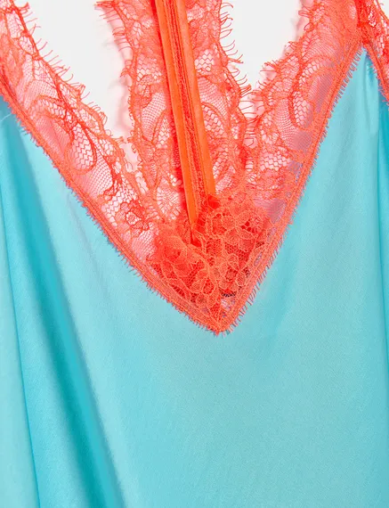 Blue slip dress with neon orange lace trimmings