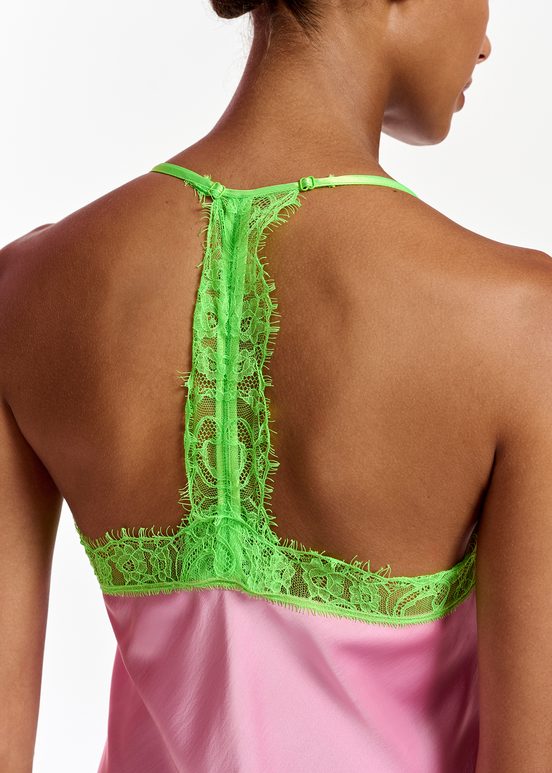 Light pink slip dress with neon green lace trimmings