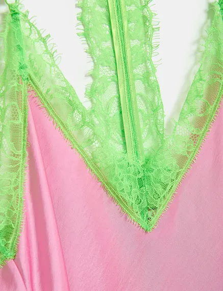 Light pink slip dress with neon green lace trimmings