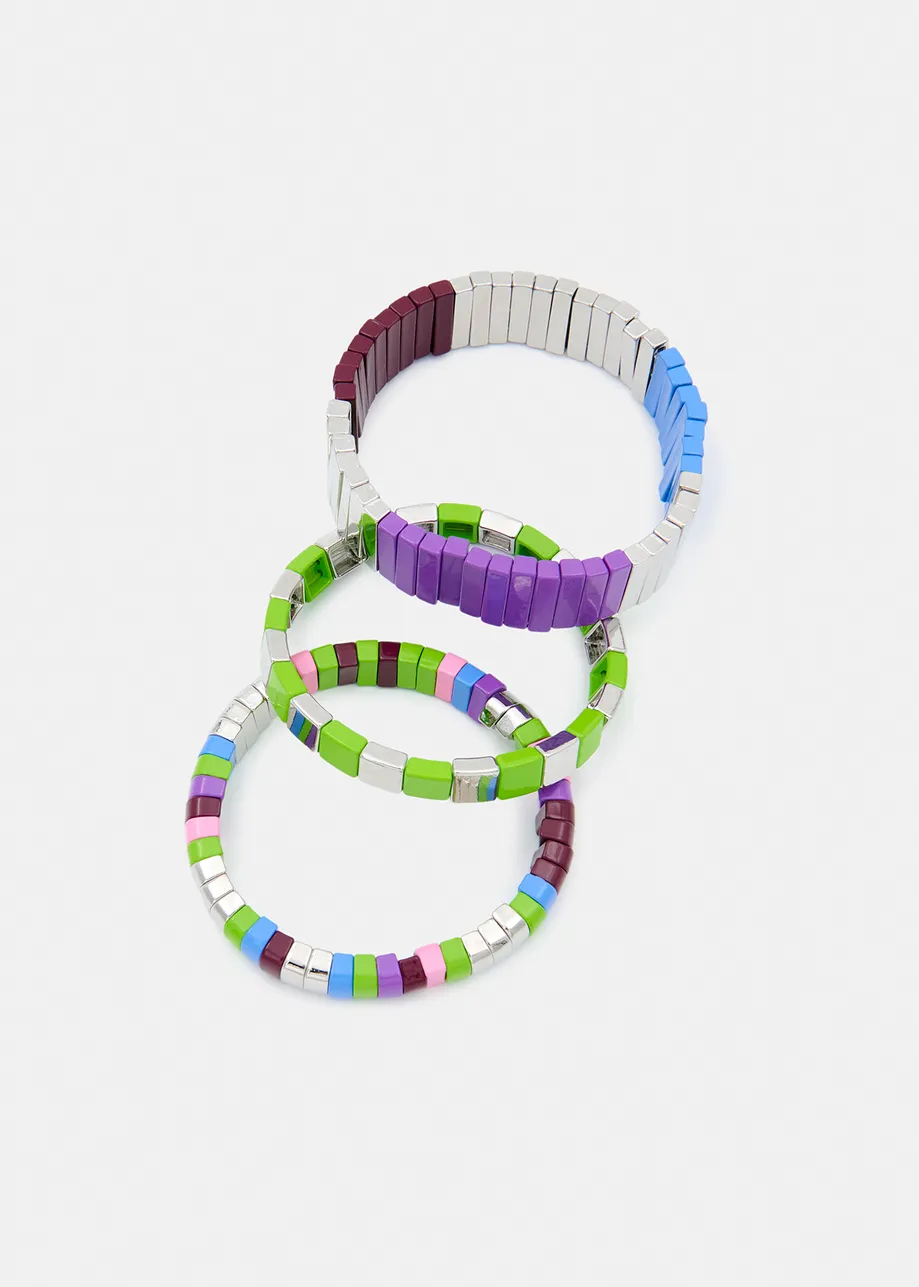 Silver, green and purple set of three bracelets