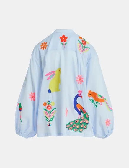 Light blue cotton shirt with embroideries