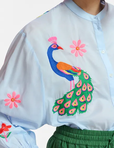 Light blue cotton shirt with embroideries