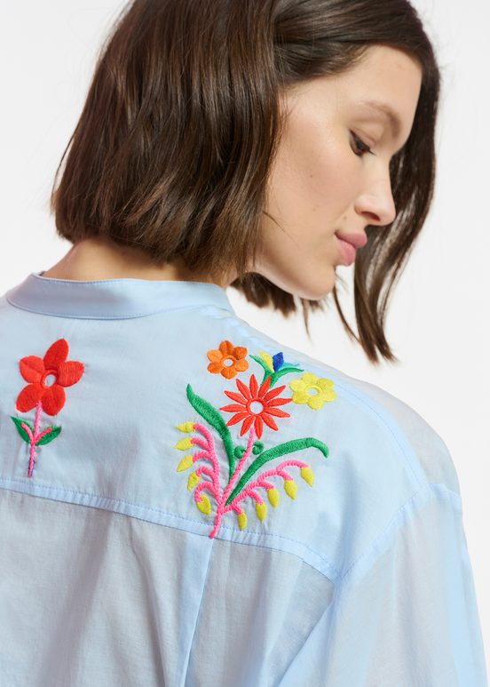 Light blue cotton shirt with embroideries