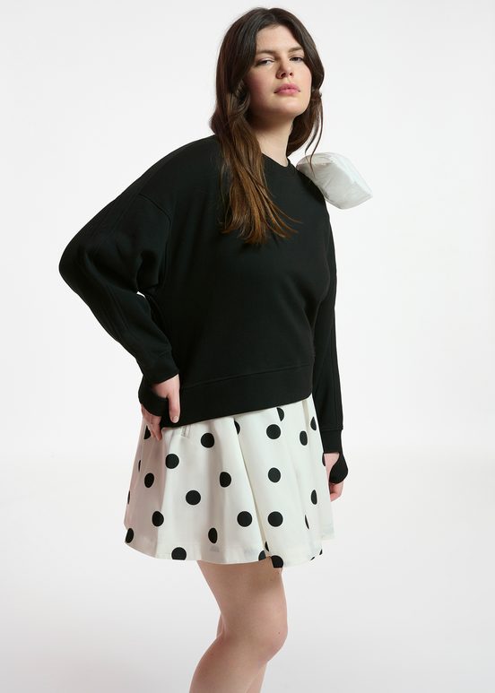 Black sweatshirt with white bow