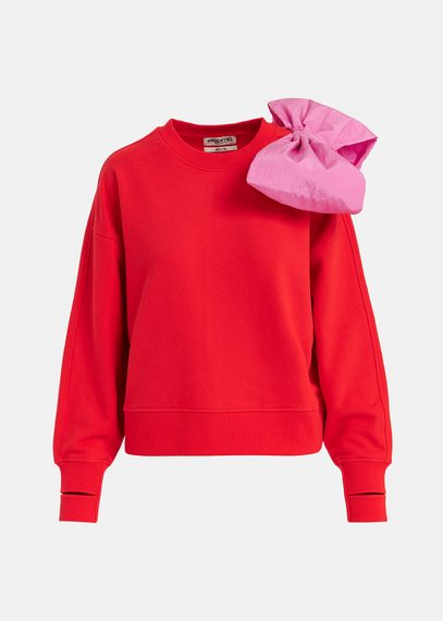 Sweatshirt rouge avec nœud rose