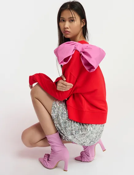 Red sweatshirt with pink bow