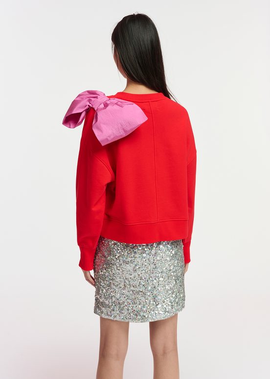 Red sweatshirt with pink bow