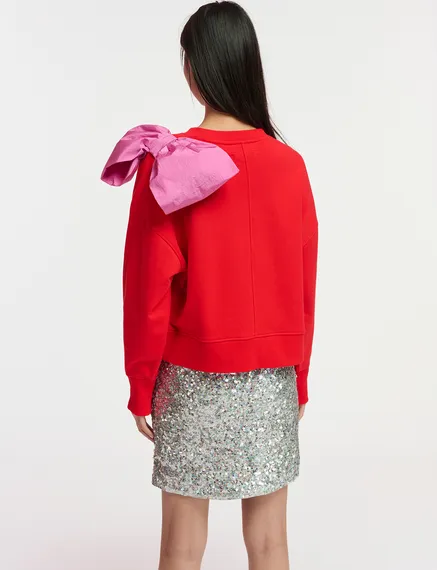 Red sweatshirt with pink bow