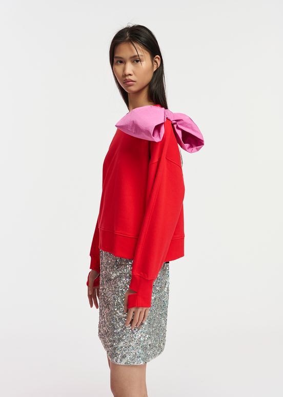 Red sweatshirt with pink bow