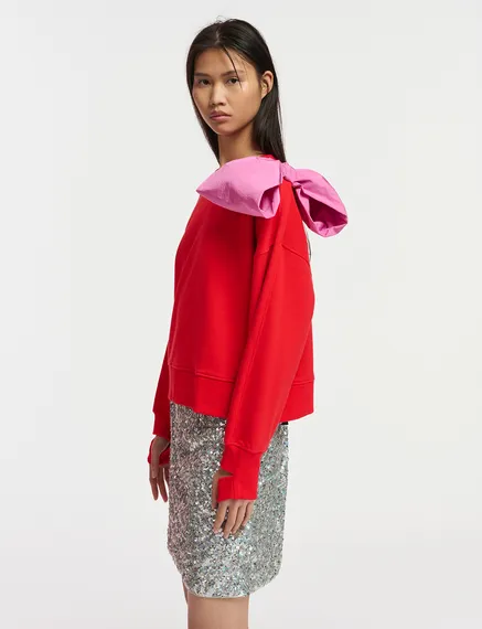 Red sweatshirt with pink bow