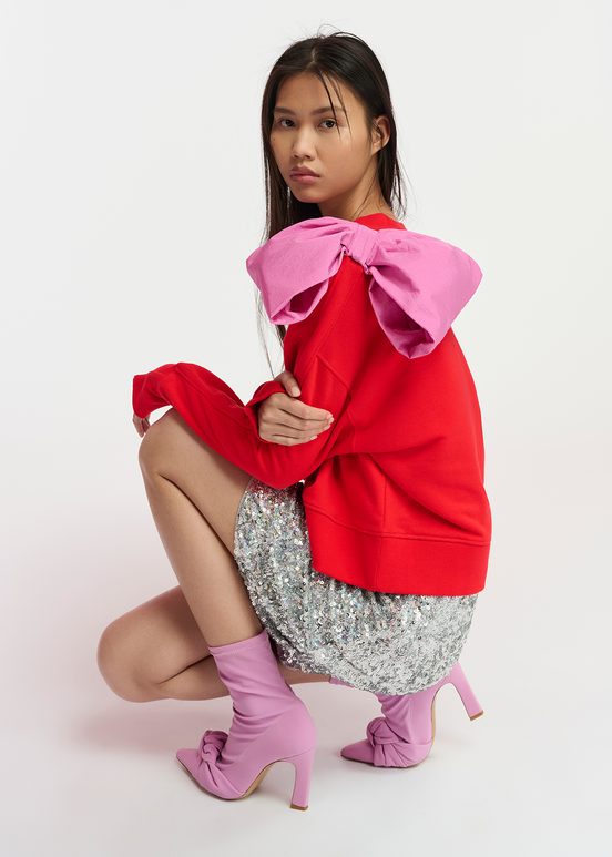 Red sweatshirt with pink bow