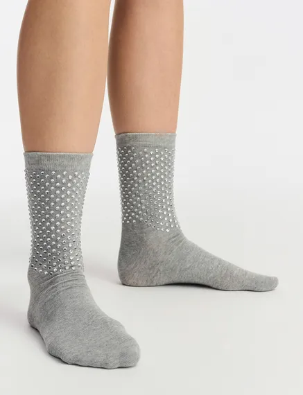 Grey socks with rhinestone embellishments