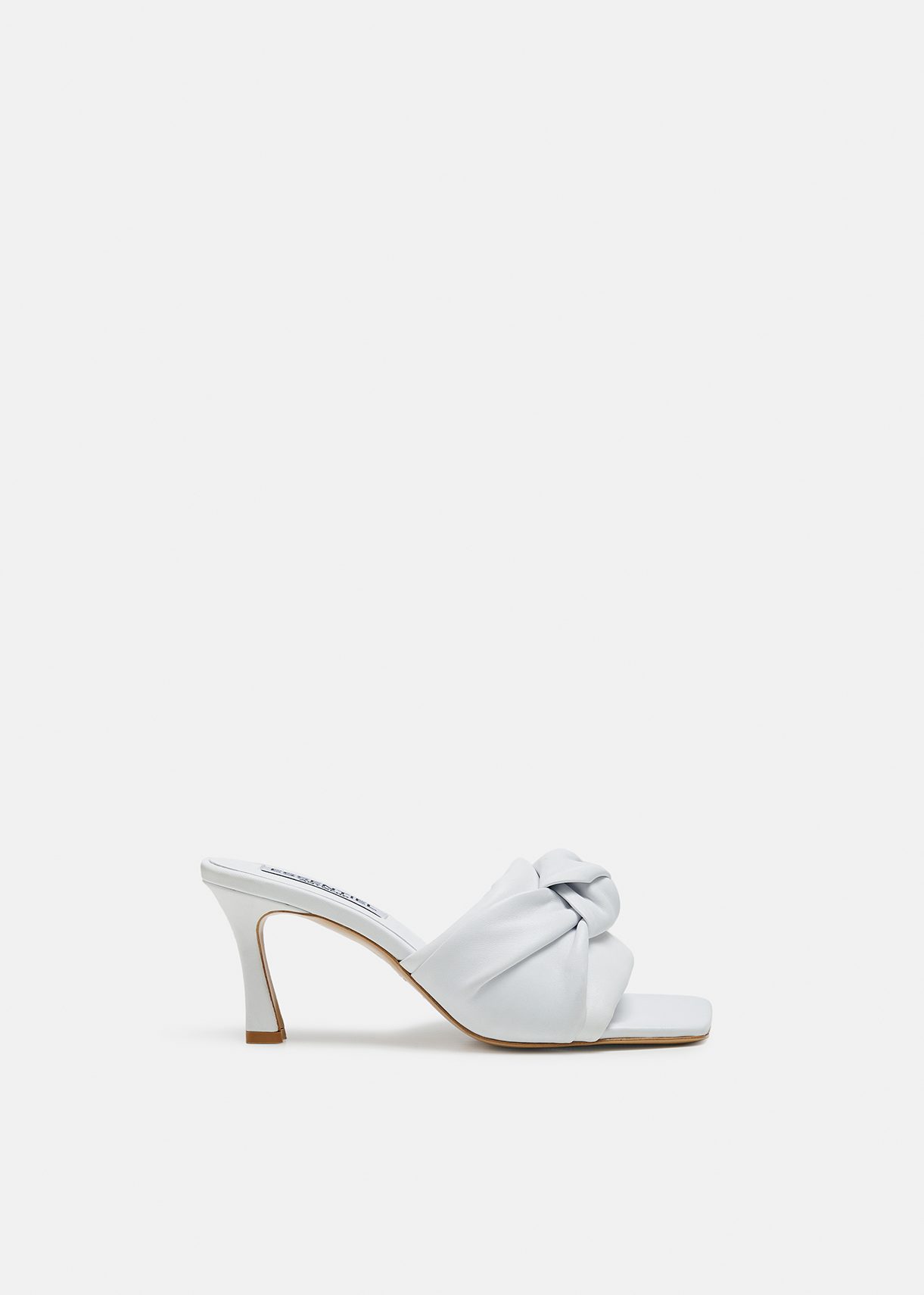 White knot-detailed leather mules