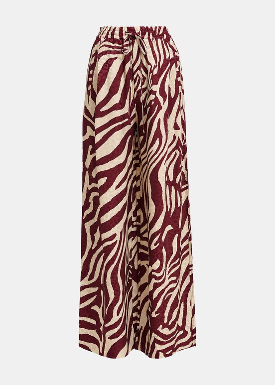 Burgundy and ecru zebra-print wide-leg pants