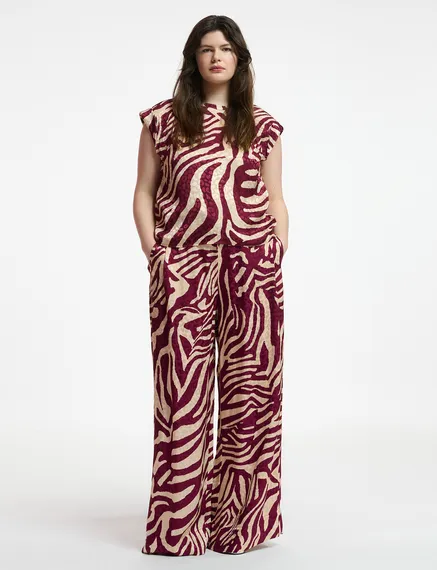 Burgundy and ecru zebra-print wide-leg pants