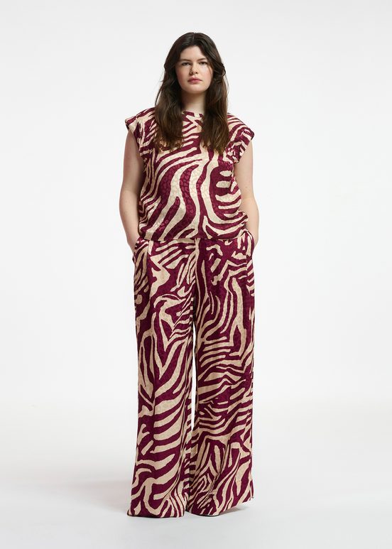 Burgundy and ecru zebra-print wide-leg pants