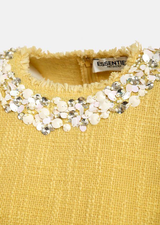 Yellow sleeveless top with sequin and bead-embellished neckline