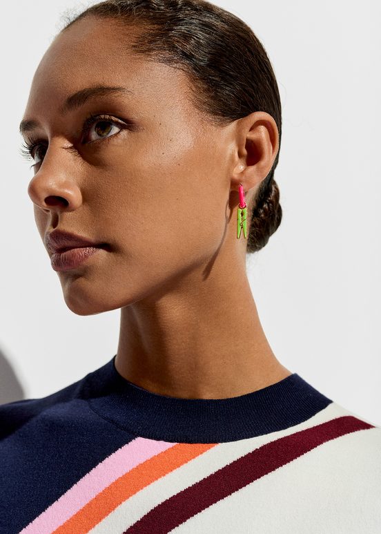 Neon pink hoop earrings with pigeon and peg pendants