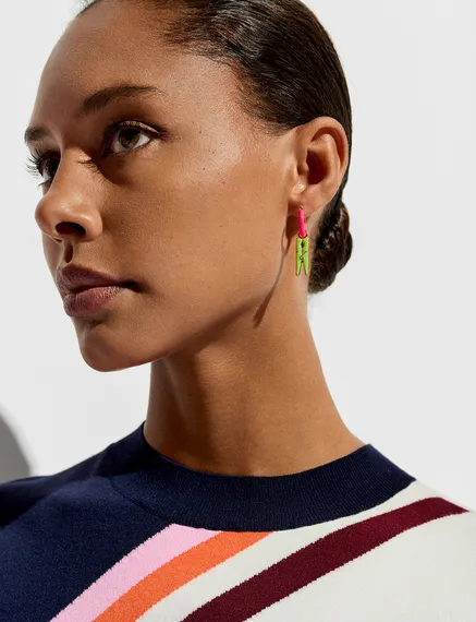 Neon pink hoop earrings with pigeon and peg pendants