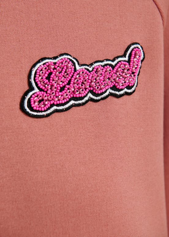 Vintage pink sweatshirt with bead embellishment