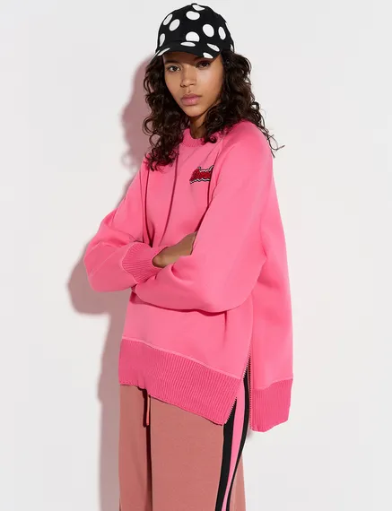 Pink sweatshirt with bead embellishment