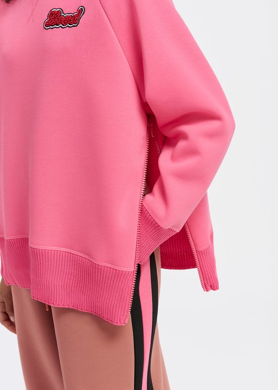 Pink sweatshirt with bead embellishment