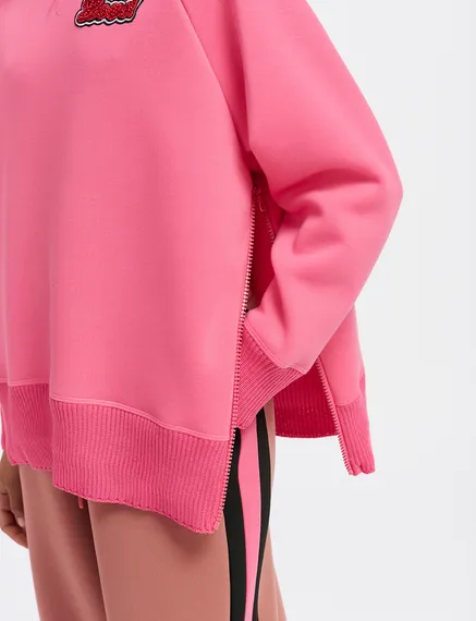 Roze sweater met kralen