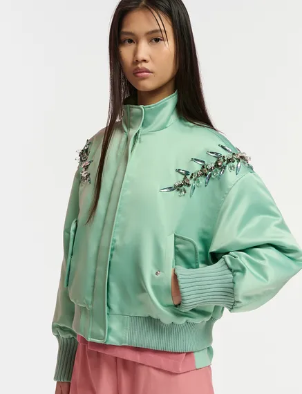 Mint green satin bomber jacket with rhinestone embellishments