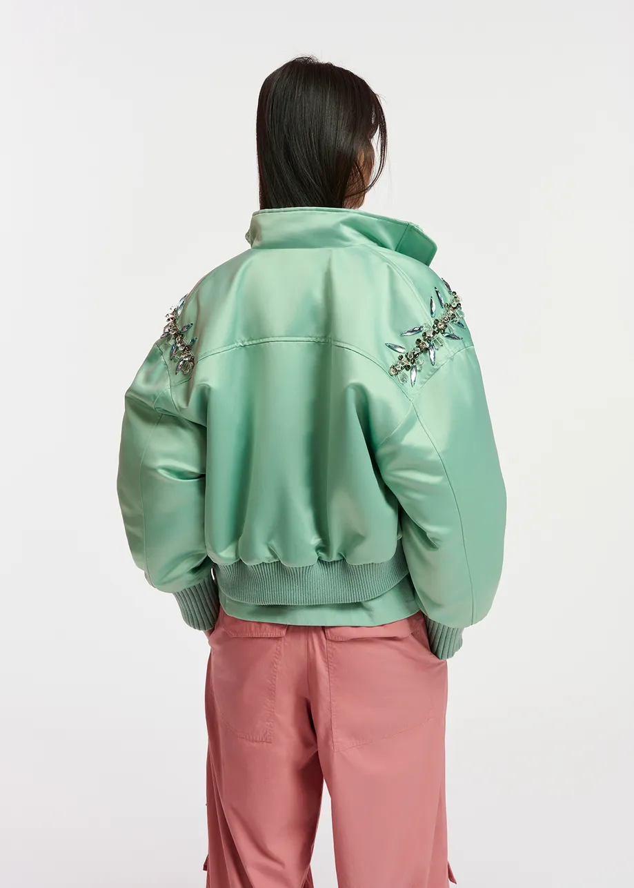 Mint green satin bomber jacket with rhinestone embellishments