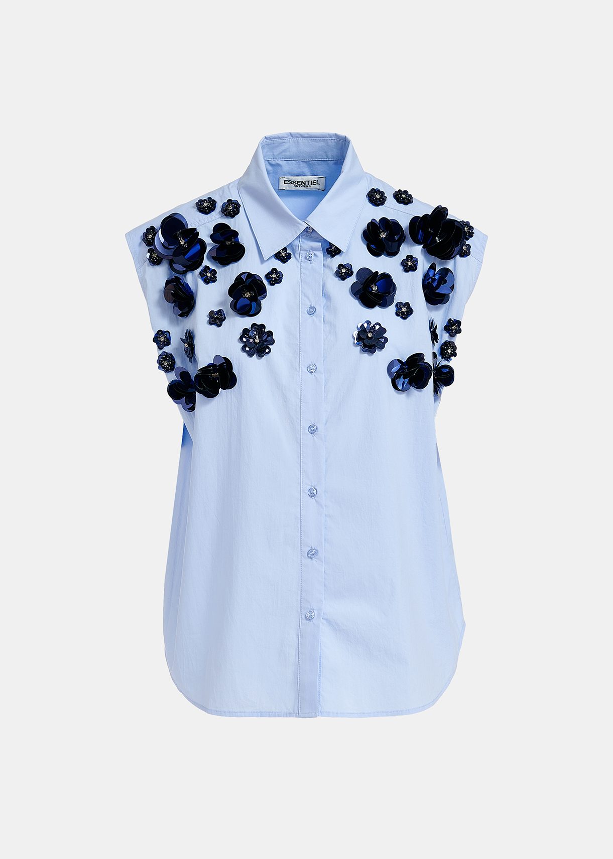 Light blue sleeveless cotton shirt with embellishments