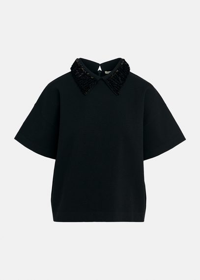 Black top with sequin-embellished collar