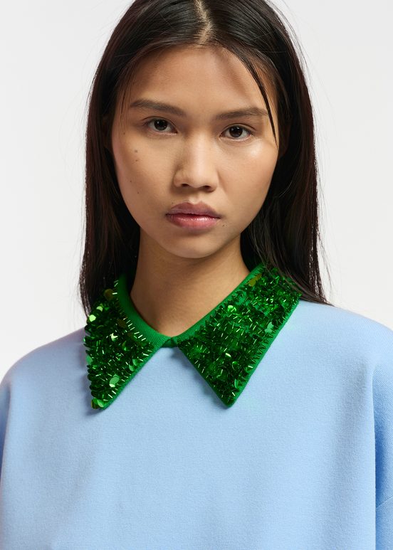 Blue top with green sequin-embellished collar