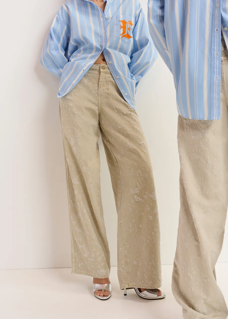 Ecru denim distressed wide-leg jeans