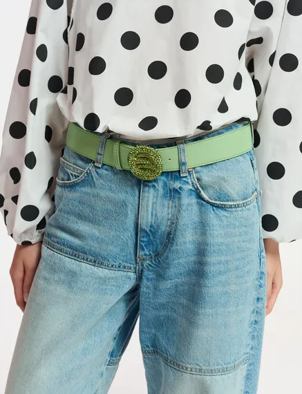 Light green belt with rhinestone-embellished buckle