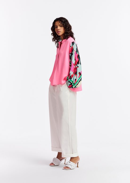 Neon pink shirt with printed sleeves