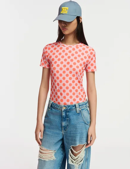 Light pink and orange polka-dotted T-shirt