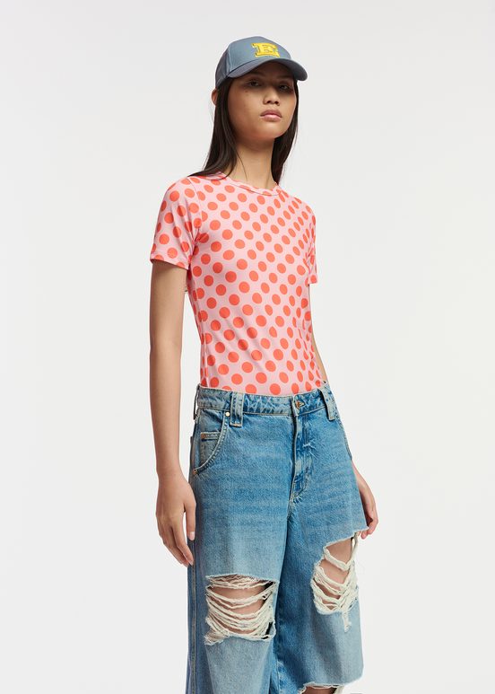 Light pink and orange polka-dotted T-shirt