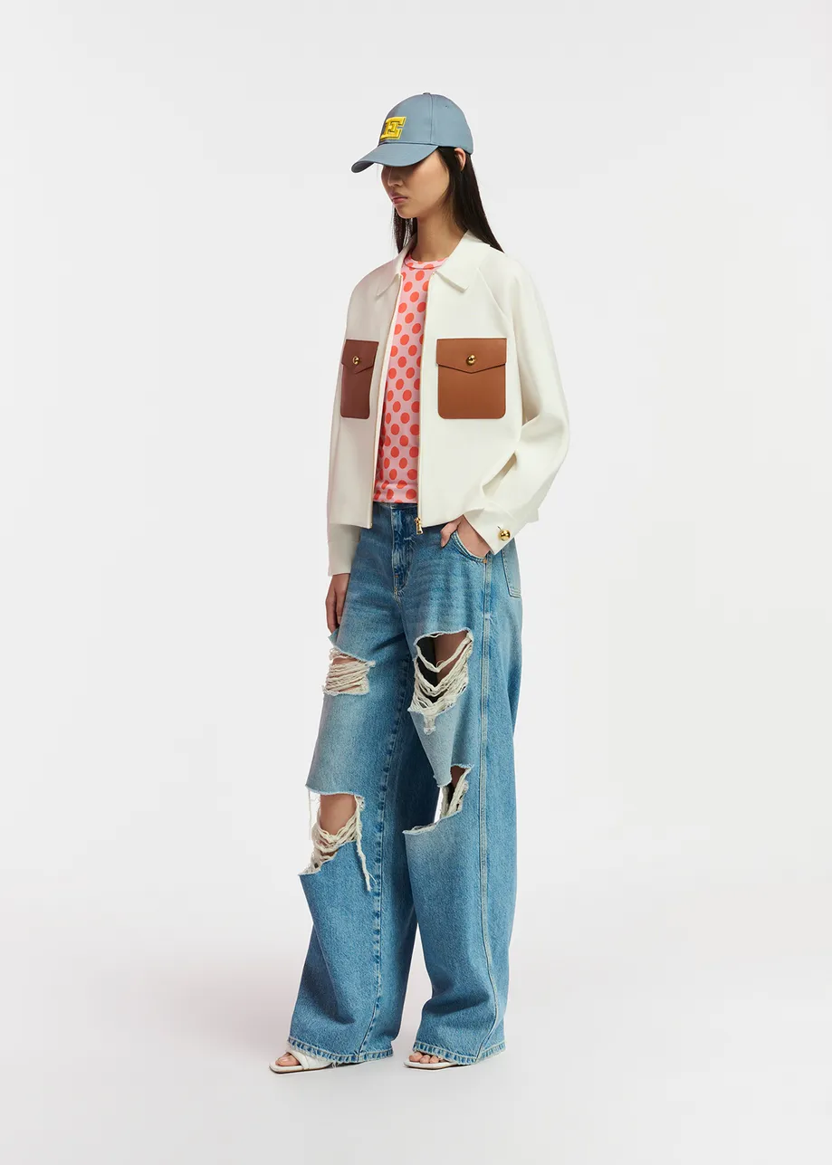 Light pink and orange polka-dotted T-shirt