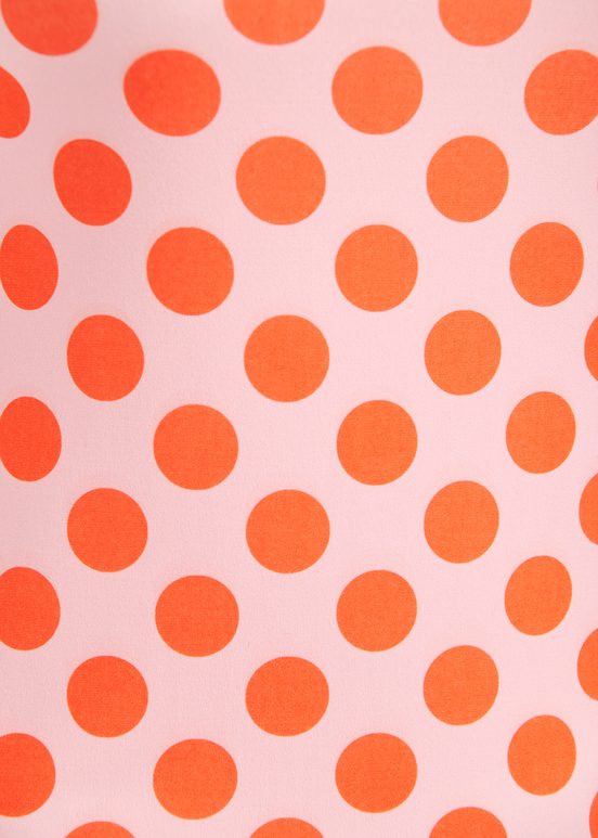 Light pink and orange polka-dotted T-shirt