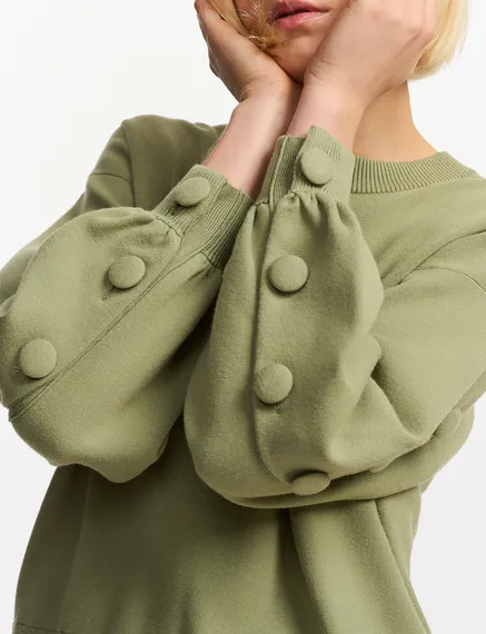 Khaki knitted sweater with buttoned sleeves