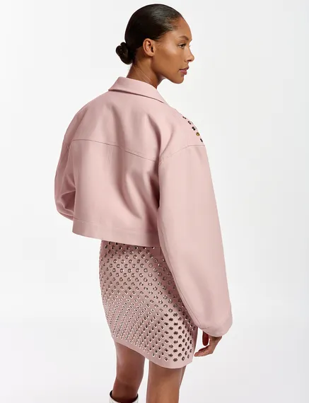 Courte veste en coton rose clair avec ornements