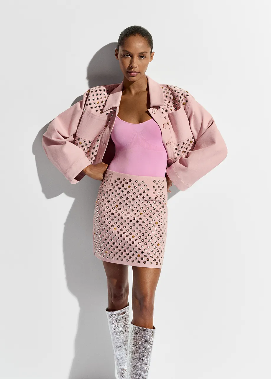 Light pink cotton canvas mini skirt with embellishments