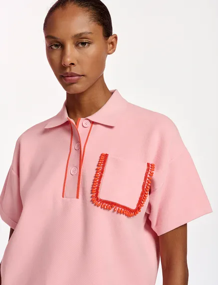 Light pink polo top with beaded embroidery